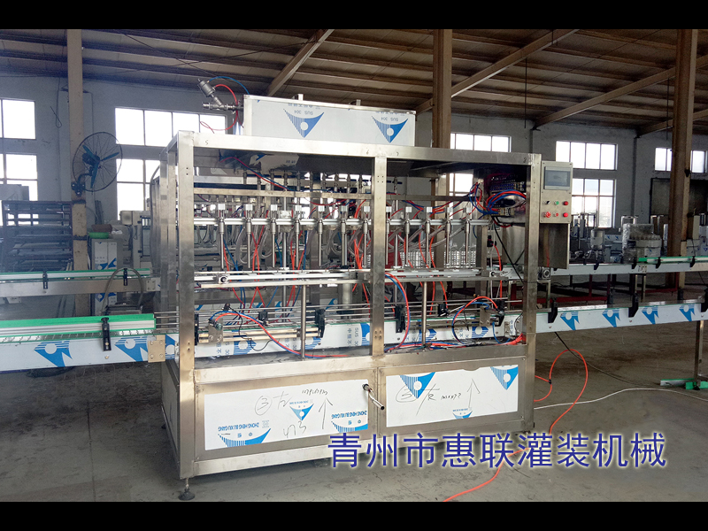 全自動液體灌裝機(jī) 全自動液體灌裝機(jī)
